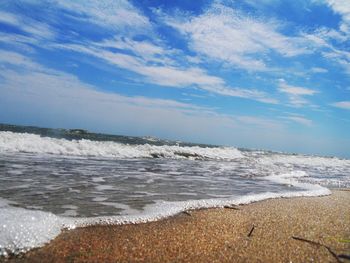 Scenic view of beach against sky