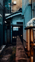 Narrow alley amidst buildings in city