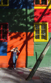 Woman exploring the la boca district in buenos aires