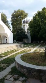 Built structure with trees in foreground