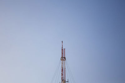 Low angle view of sailboat against clear sky