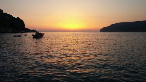View of calm sea at sunset