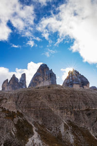 Low angle view of rock formations against sky