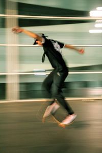 Side view of a man jumping