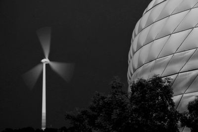 Low angle view of wind turbine against sky