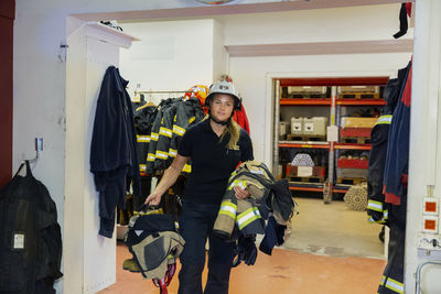 Female firefighter in fire station