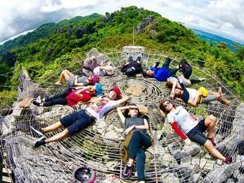 People relaxing on landscape