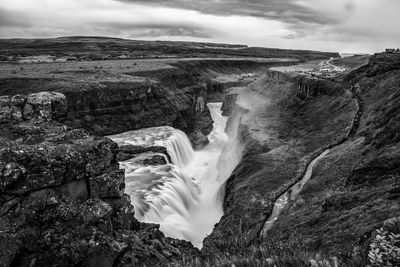 View of waterfall against sky