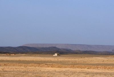 Scenic view of desert against sky