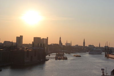 High angle view of river against buildings