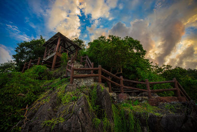 Built structure on land against sky