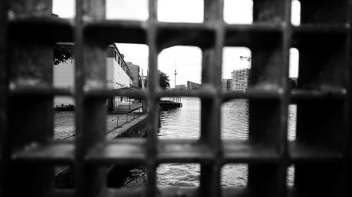 Close-up of window against sea