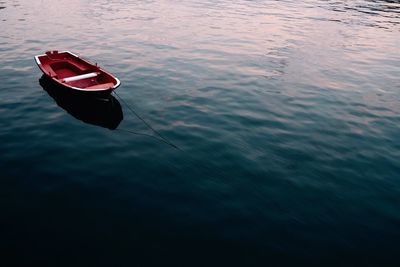 High angle view of red boat in water