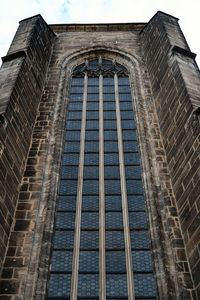 Low angle view of old building against sky