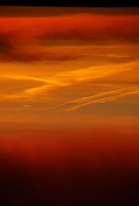 Scenic view of dramatic sky during sunset