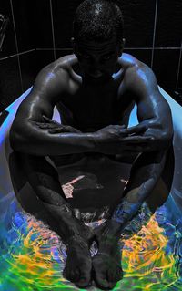 Portrait of young man in swimming pool