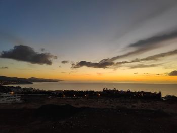 Scenic view of landscape against sky during sunset