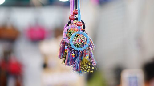Close-up of multi colored hanging outdoors