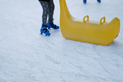Low section of person on ice rink
