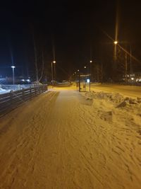 Street in city at night during winter