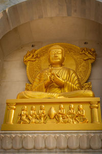 Low angle view of buddha statue in temple