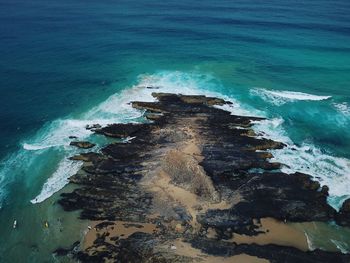 High angle view of rocks on beach