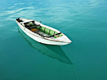 High angle view of boat moored in water