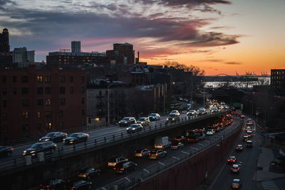 Colorful sunset on the brooklyn queens expy highway between brooklyn and manhattan in ny