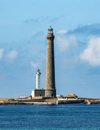 Lighthouse by sea against sky - phare de l ile vierge