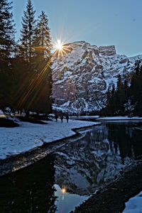 Scenic view of snowcapped mountains against sky during winter