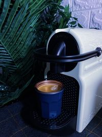 High angle view of coffee cup on table