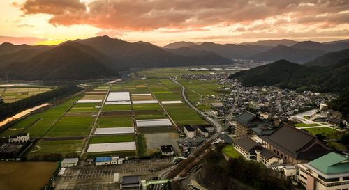 High angle view of townscape against sky during sunset