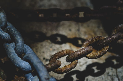 High angle view of rusty chains at night