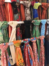 Close-up of scarves hanging at market stall