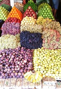 Various fruits for sale in market stall