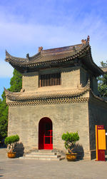 Exterior of historic building against sky