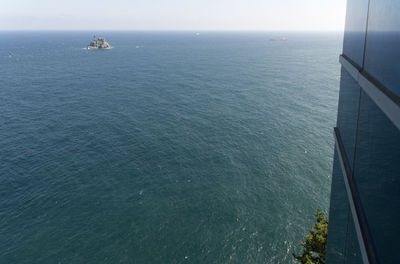 High angle view of ship sailing on sea