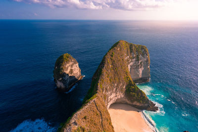 Scenic view of cliff at beach