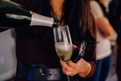 Close-up of hand holding camera