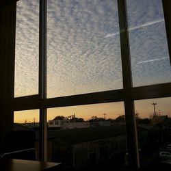 Built structure against sky at sunset