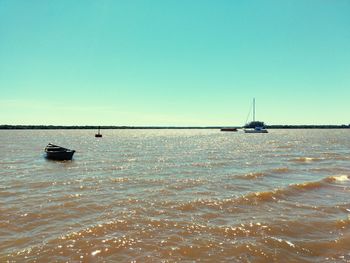 Scenic view of sea against clear sky