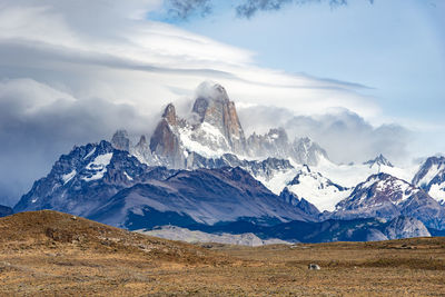 Scenic view of snowcapped mountains against sky