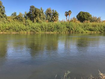 Scenic view of lake against sky