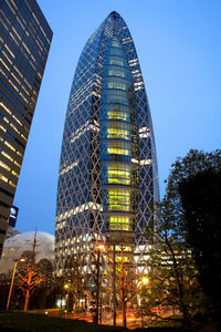 Low angle view of modern buildings against sky