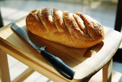 High angle view of bread on cutting board