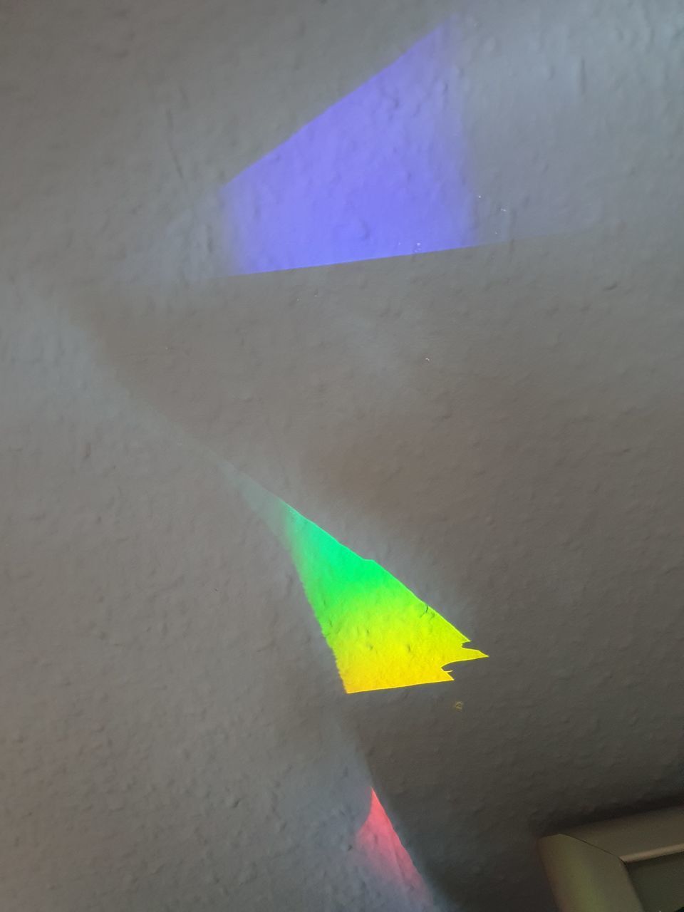 HIGH ANGLE VIEW OF COLORED PAPER ON WALL