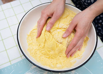 Cropped hand of person having food