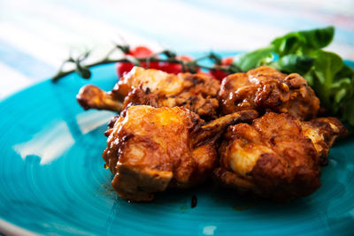 Close-up of fried chicken in plate