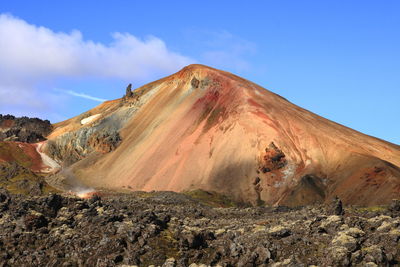 Panoramic view of volcanic landscape against sky