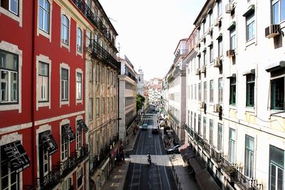 Street amidst buildings against sky